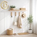 Modern small entryway featuring vertical storage hacks and a floating shelf.